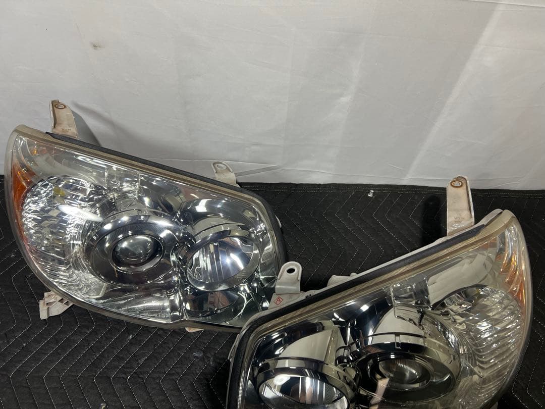 210 215 ハイラックス サーフ 後期 ヘッドライト　左右セット 刻印A