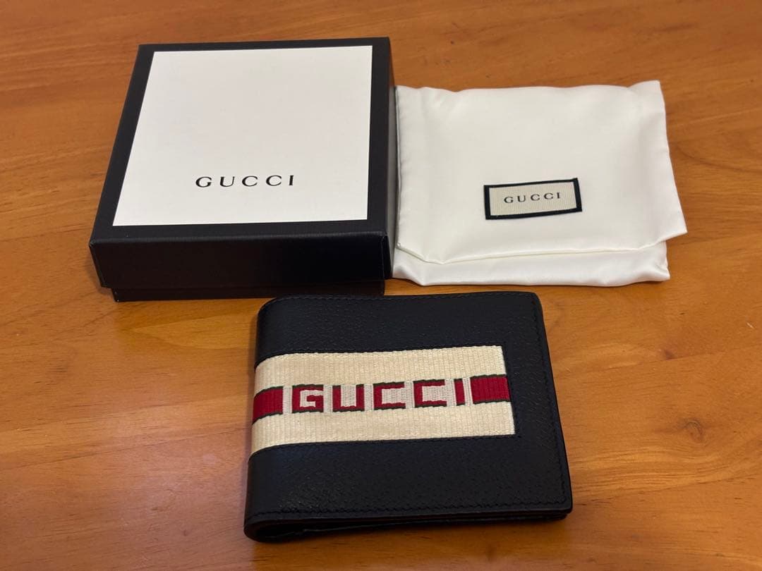 GUCCI 二つ折り財布 ブラック ストライプ
