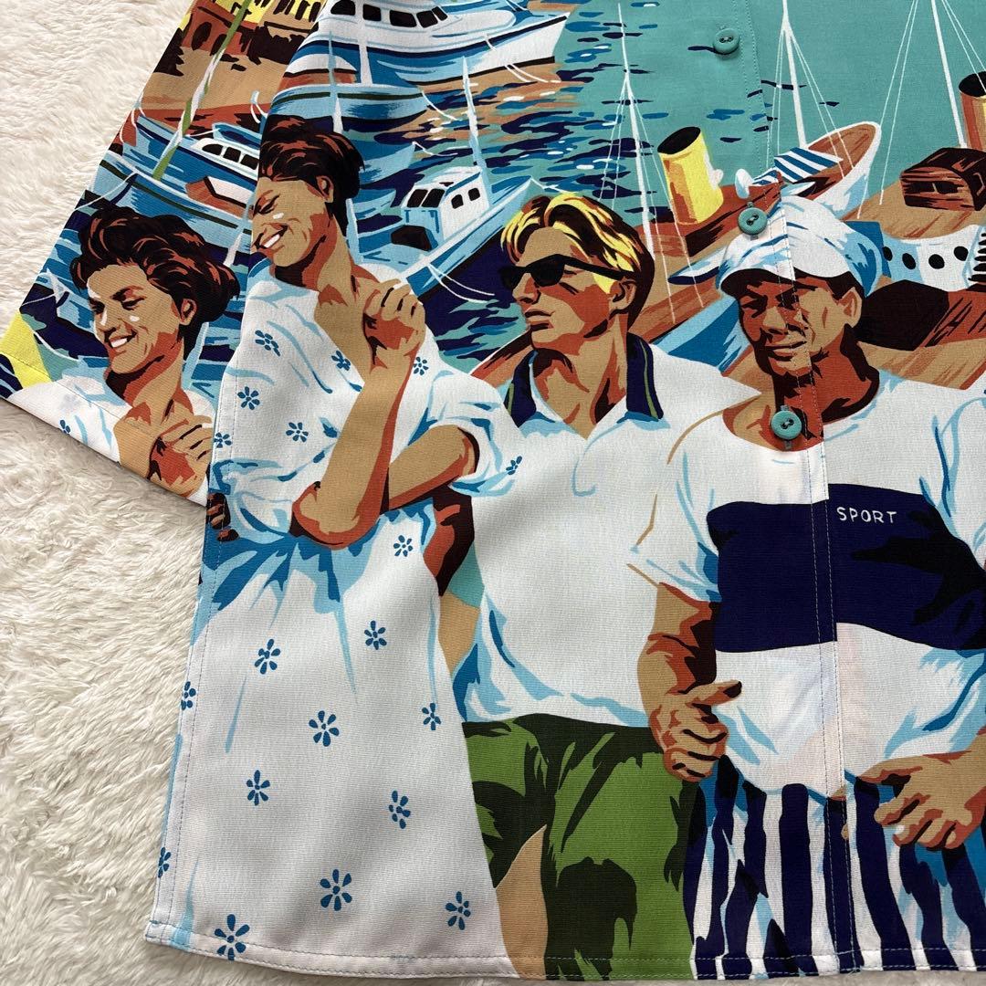 トクコプルミエヴォル　プリントチュニックシャツ　海岸　人々　リゾート　パリ