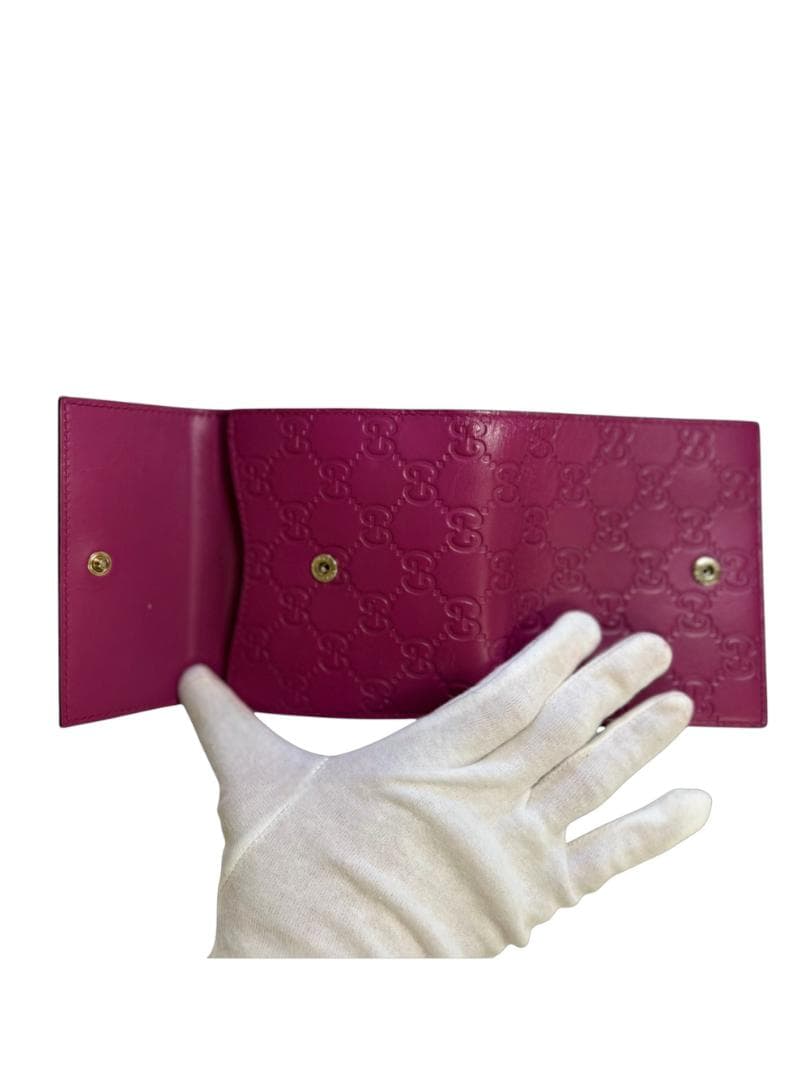 GUCCI（グッチ）グッチシマレザー 二つ折り財布 Wホック リボンモチーフ