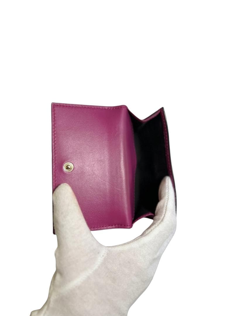 GUCCI（グッチ）グッチシマレザー 二つ折り財布 Wホック リボンモチーフ