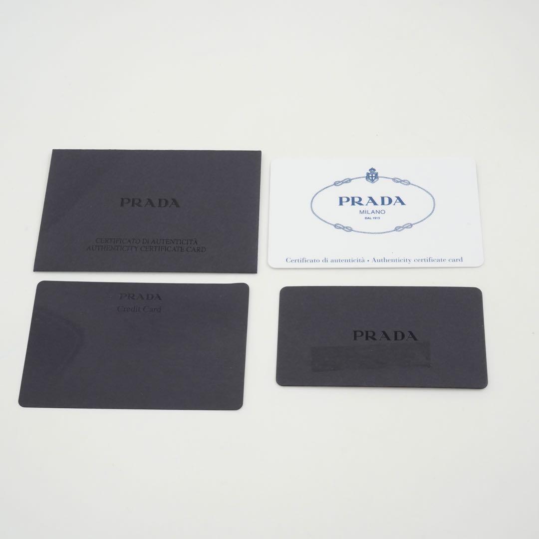 ✨未使用展示品・箱保証書付き✨　PRADA ミニ財布　サフィアーノレザー　L字