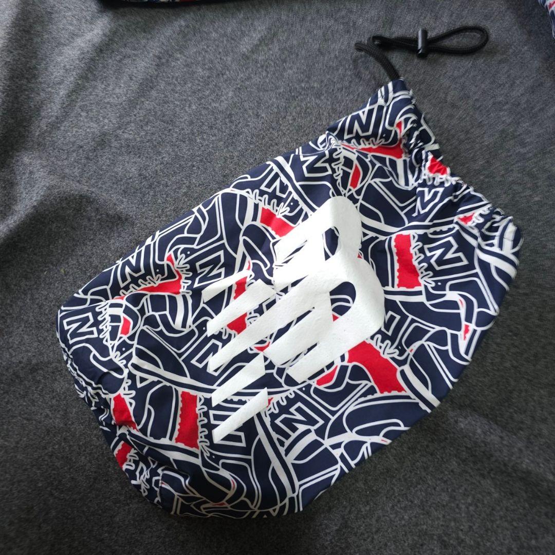 ニューバランスゴルフ】スニーカー総柄 撥水ナイロンブルゾン×スカートアップMS