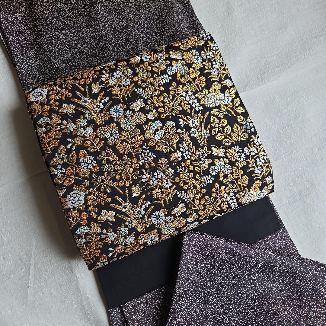 帯屋捨松　細かな煌めきを締める　草花模様の名古屋帯