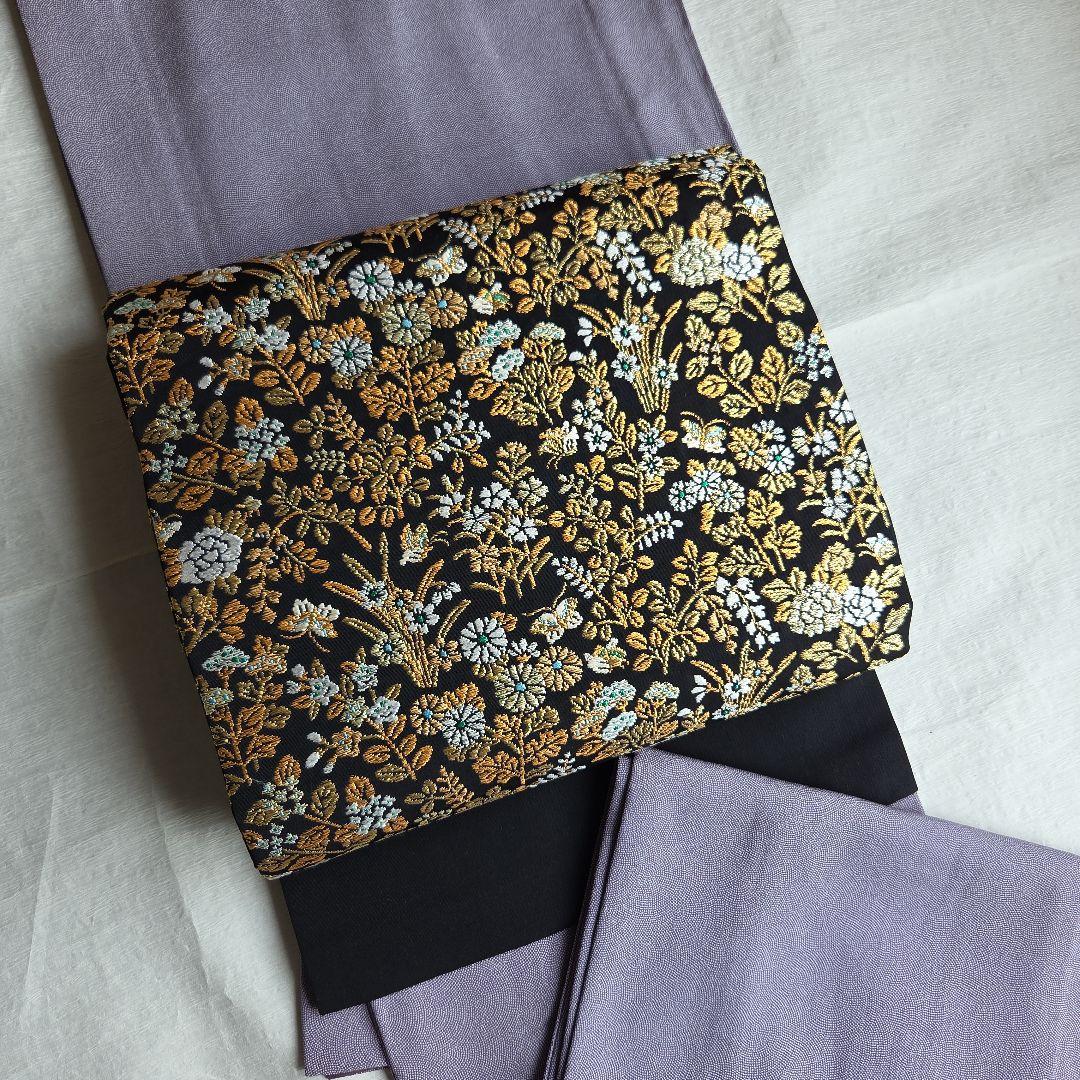 帯屋捨松　細かな煌めきを締める　草花模様の名古屋帯