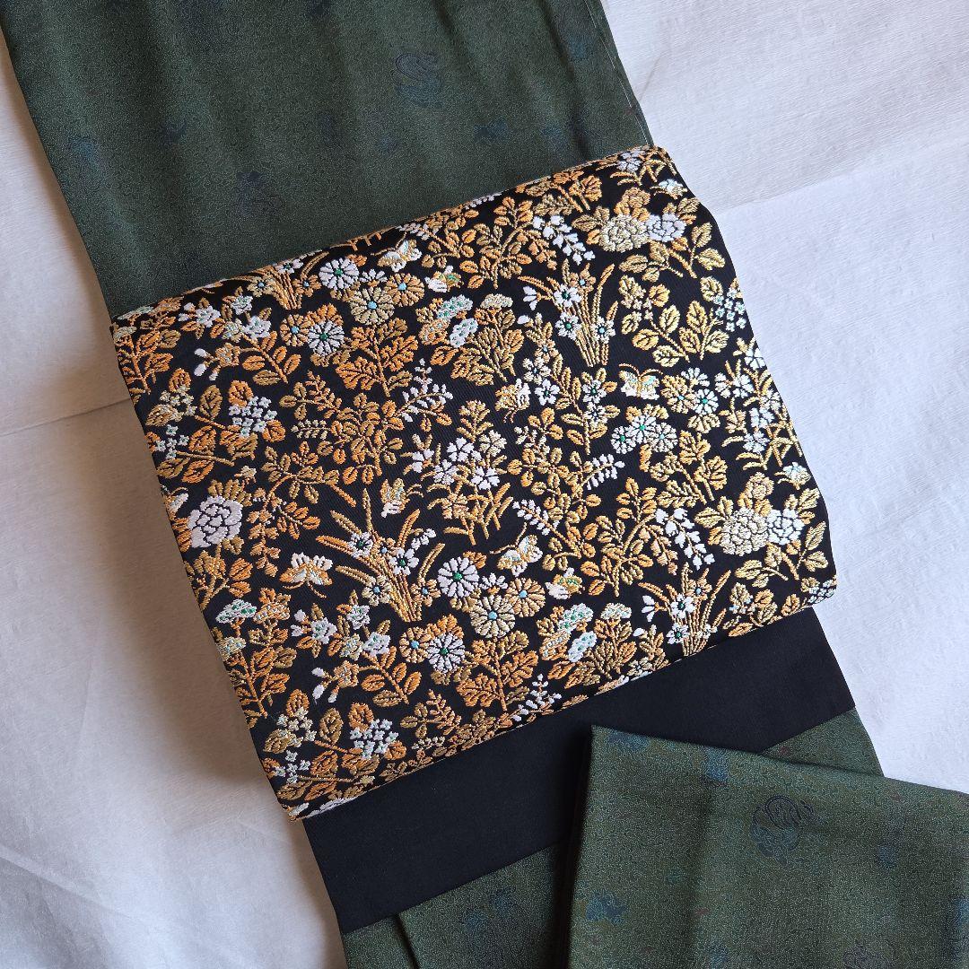 帯屋捨松　細かな煌めきを締める　草花模様の名古屋帯
