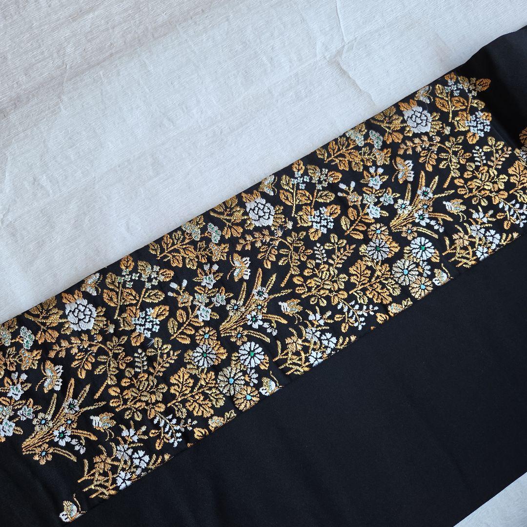 帯屋捨松　細かな煌めきを締める　草花模様の名古屋帯