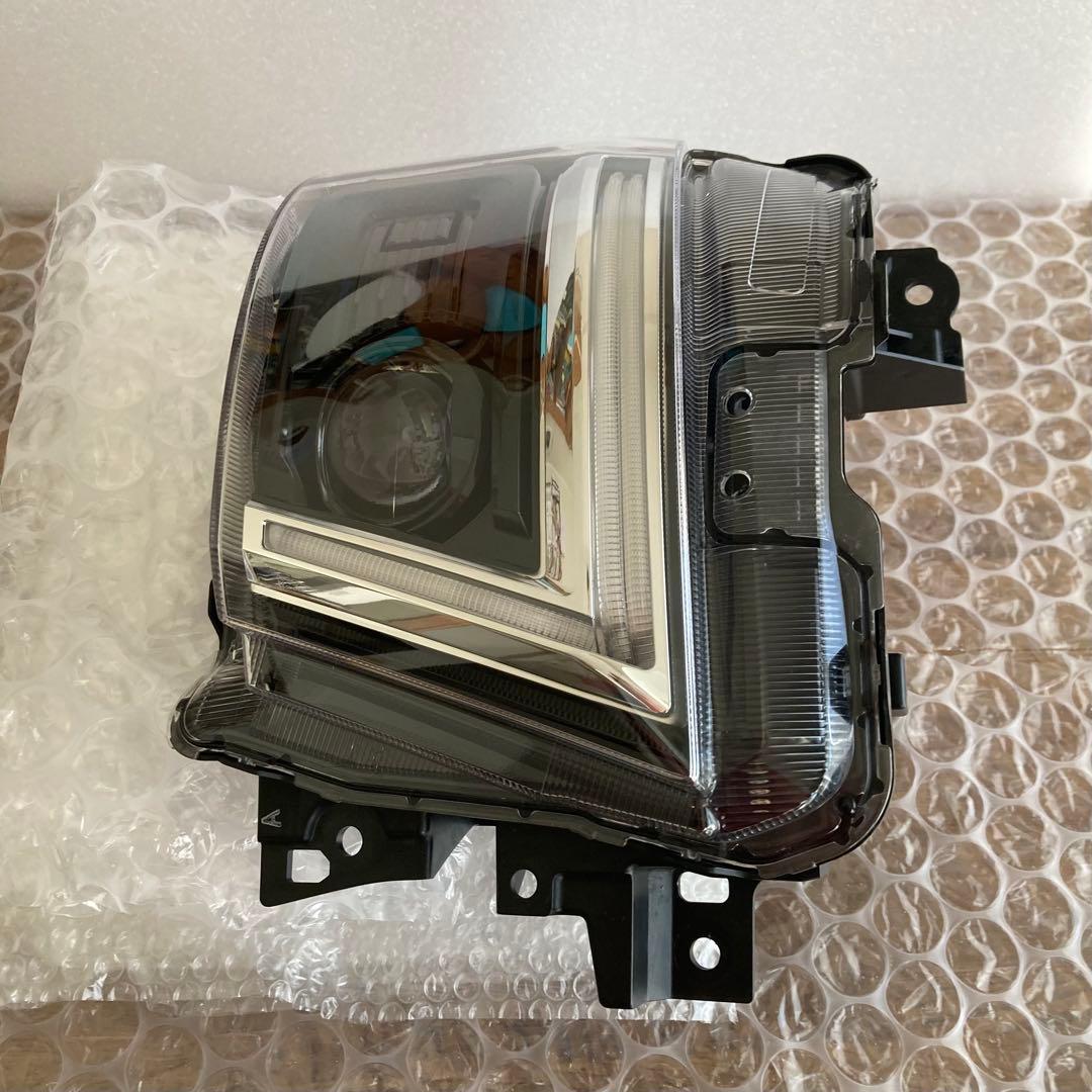 (中古品)いすゞエルフ純正ヘッドライト(左)　送料込み