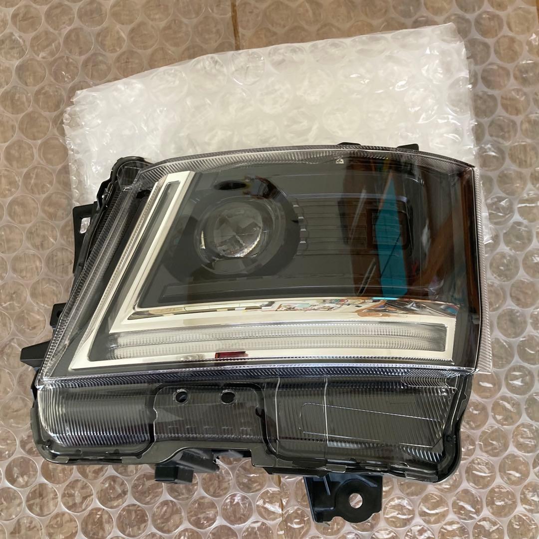 (中古品)いすゞエルフ純正ヘッドライト(左)　送料込み