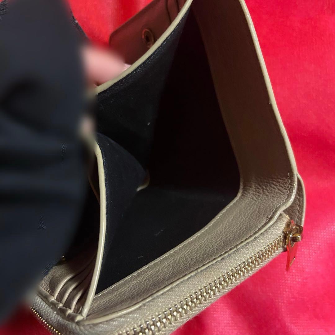 イヴサンローラン 二つ折り財布　カサンドラ　YSL　ピンクベージュ