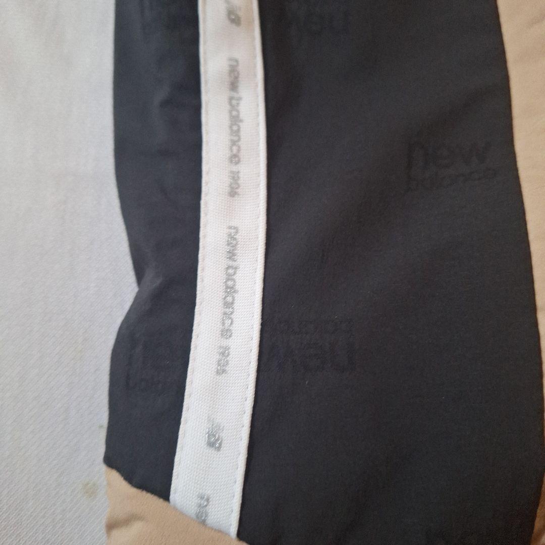 New Balance ベージュ ノースリーブダウンベスト