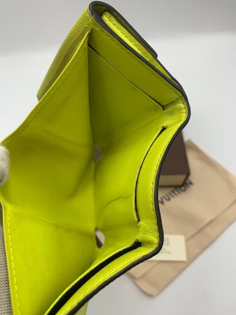 ルイヴィトン タイガラマ ディスカバリーコンパクト イエロー 折り財布 P55