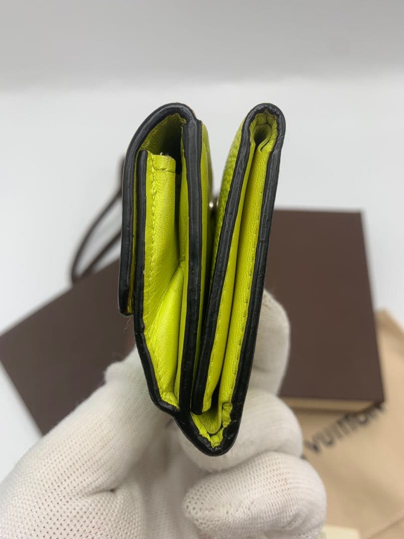 ルイヴィトン タイガラマ ディスカバリーコンパクト イエロー 折り財布 P55