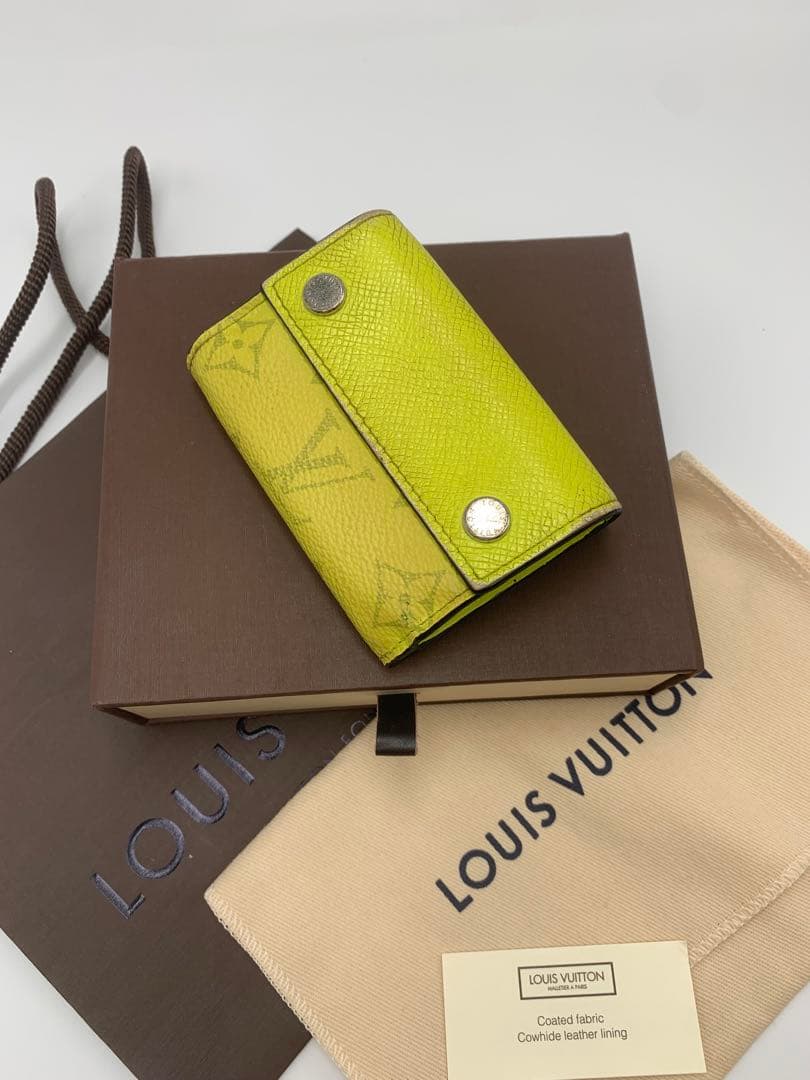 ルイヴィトン タイガラマ ディスカバリーコンパクト イエロー 折り財布 P55