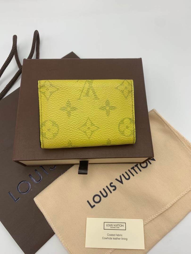 ルイヴィトン タイガラマ ディスカバリーコンパクト イエロー 折り財布 P55