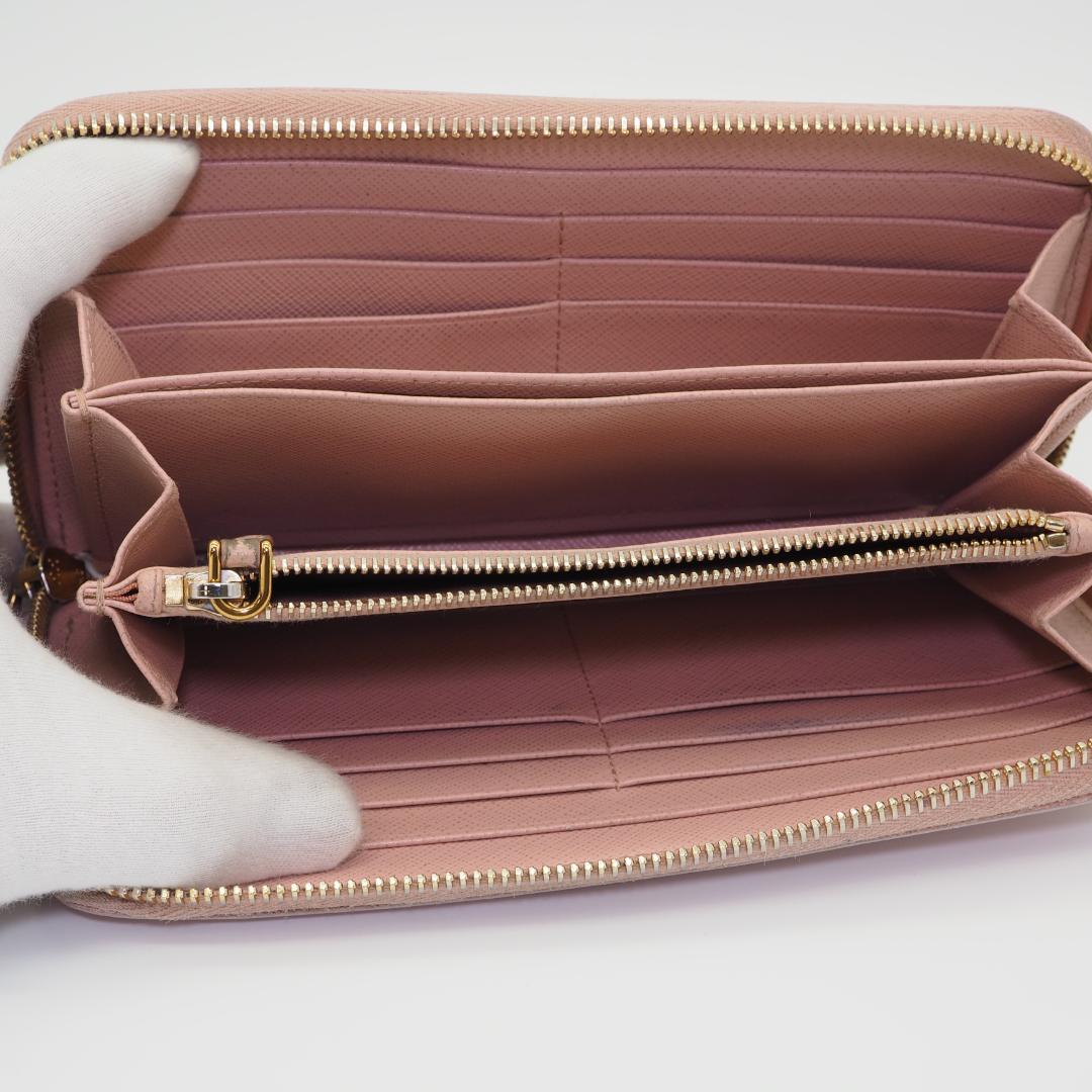 PRADA プラダ サフィアーノ ラウンドファスナー ピンク系 ゴールドロゴ