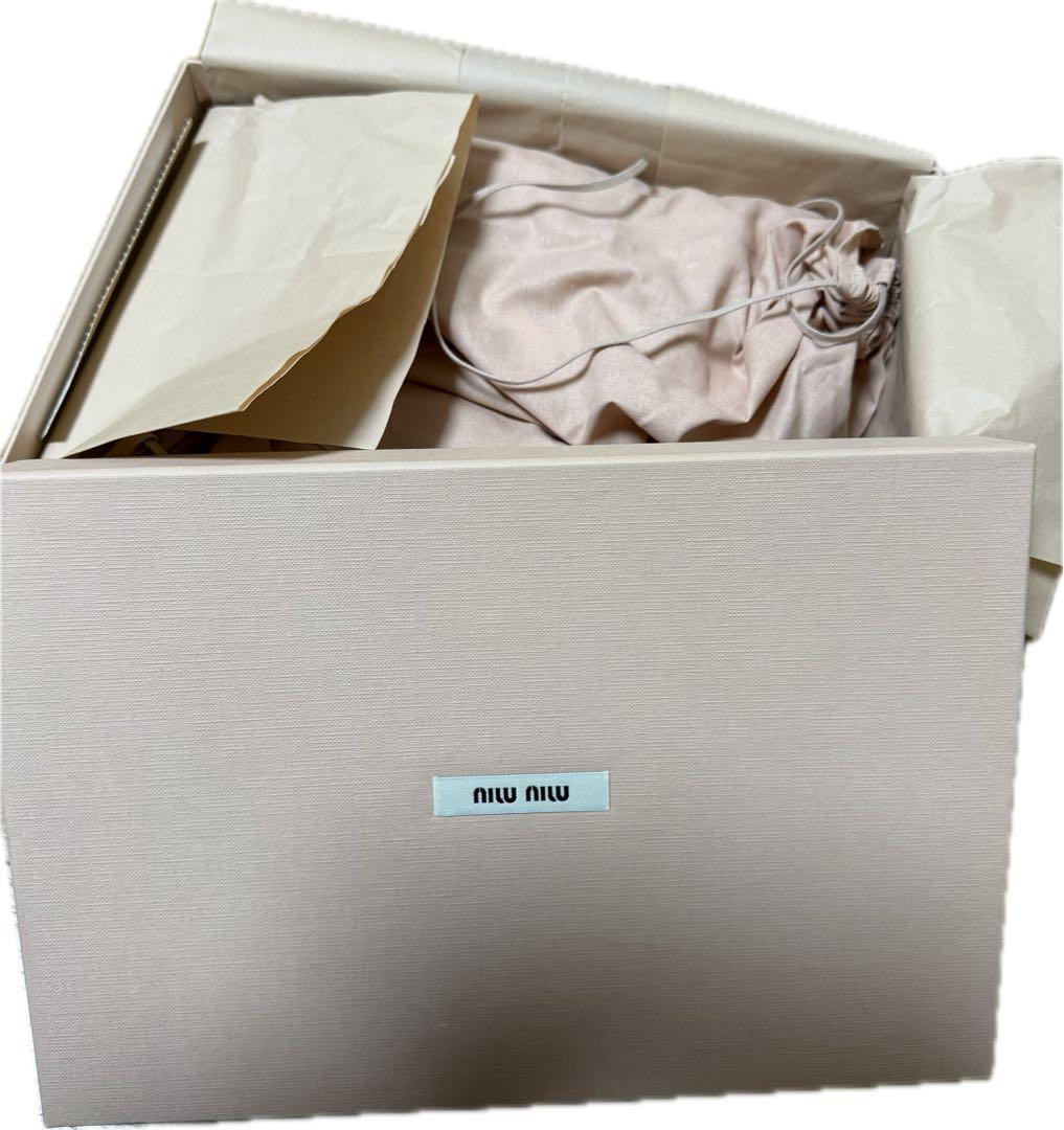 miumiu グリッターシルバースニーカー ストーン装飾付き