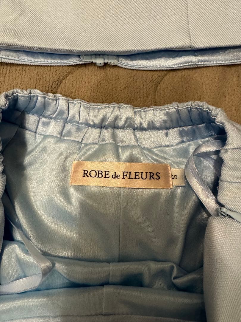 ROBE de FLEURSアシンメトリーリボンティアードフリルミニキャバドレス