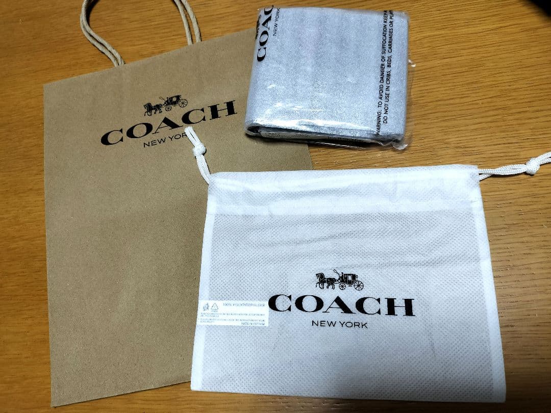 COACH　財布　札入れ　ラケットプリント　紙袋　不織布付