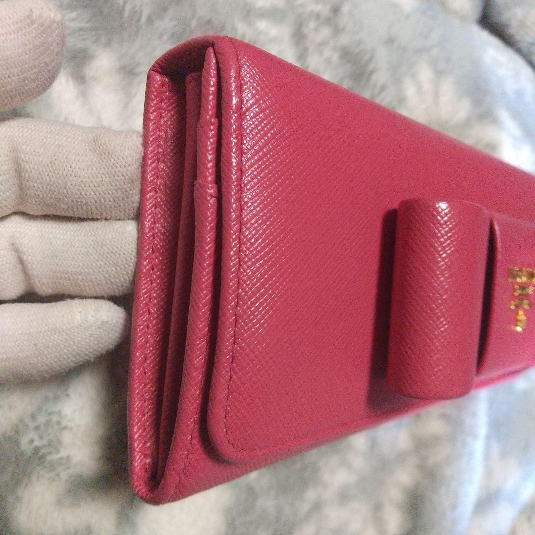 PRADAサフィアーノ レザーリボン付き 長財布 レッド系