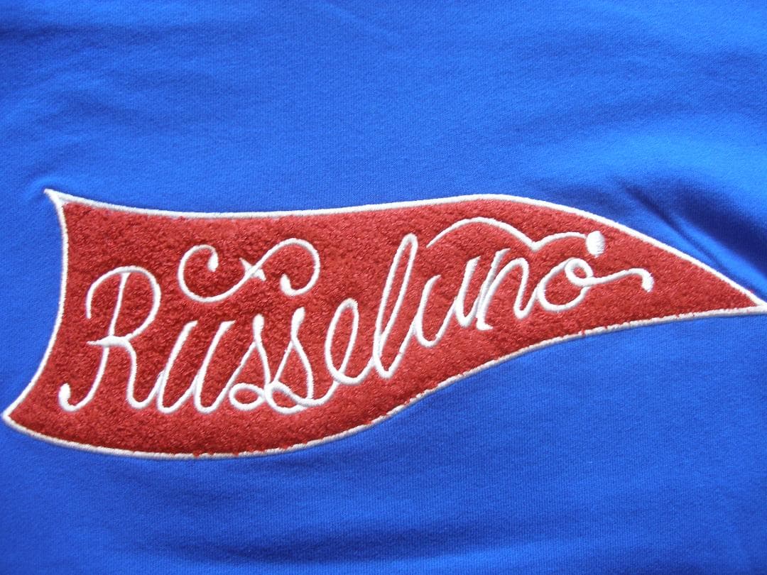 ラッセルノ FLAGロゴ MASK HOODIE メンズサイズ(5) ブルー新品