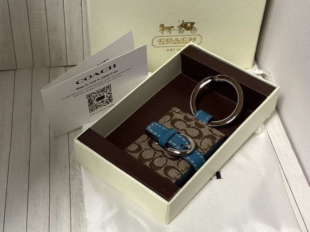 箱付未使用美品コーチCOACH キーリング ブラウン ブルー写真入手帳型チャーム