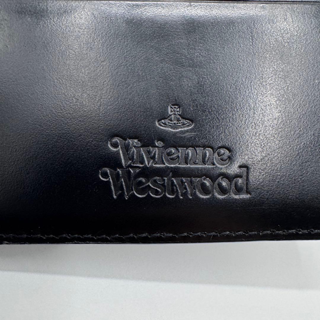 美品✨ヴィヴィアン　マネークリップ　小銭入れ付　二つ折り財布　オーブ型押し　黒