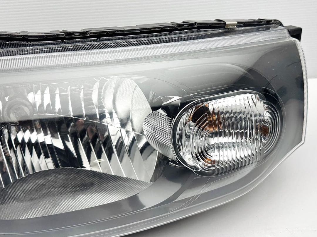 キューブ ヘッドライト ヘッドランプ ハロゲン STANLEY P8190