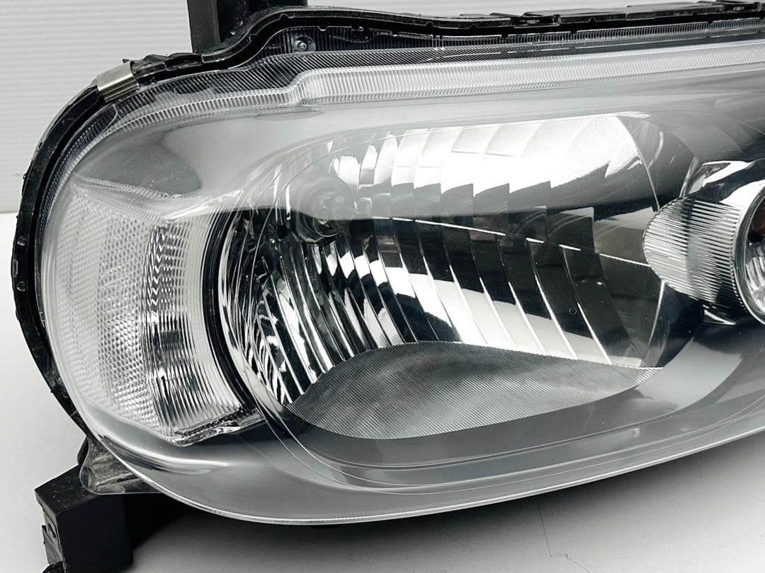 キューブ ヘッドライト ヘッドランプ ハロゲン STANLEY P8190