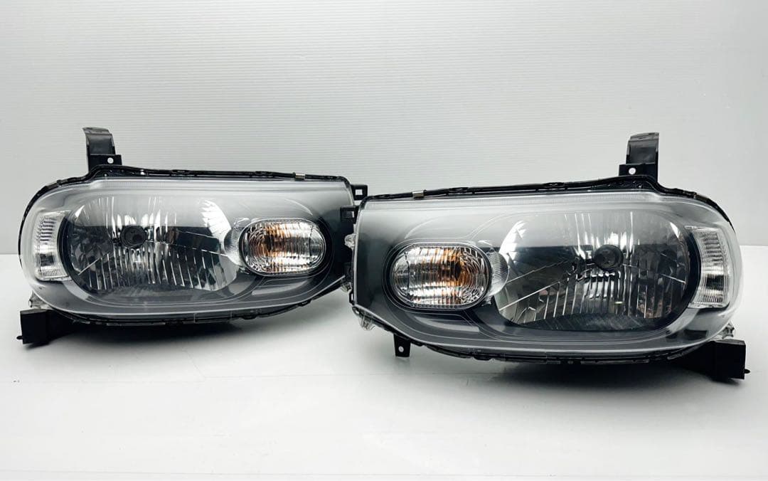 キューブ ヘッドライト ヘッドランプ ハロゲン STANLEY P8190