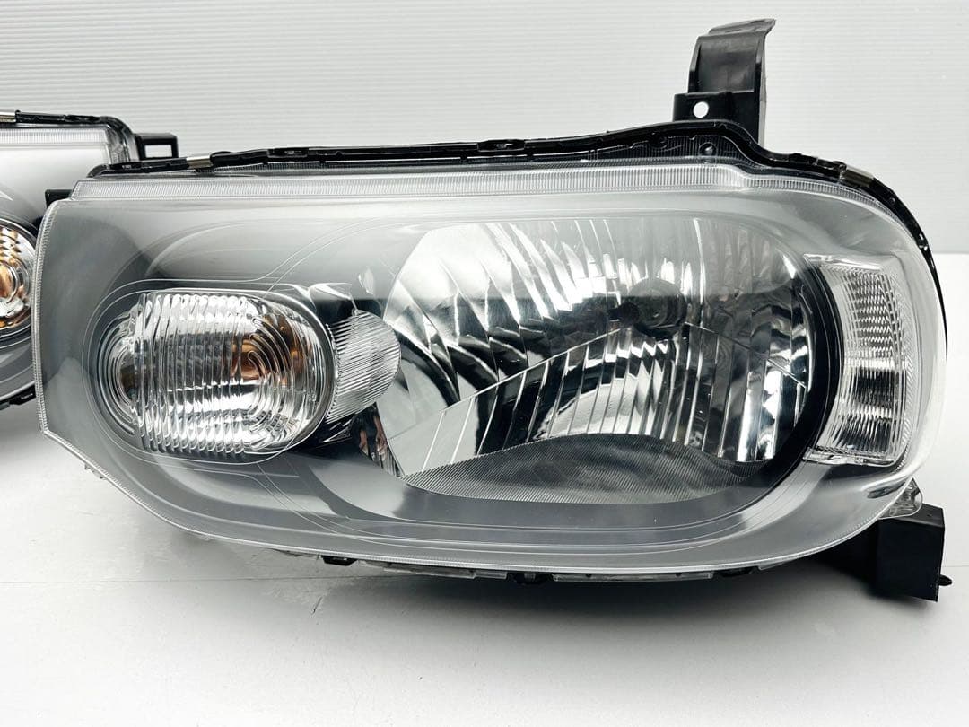 キューブ ヘッドライト ヘッドランプ ハロゲン STANLEY P8190