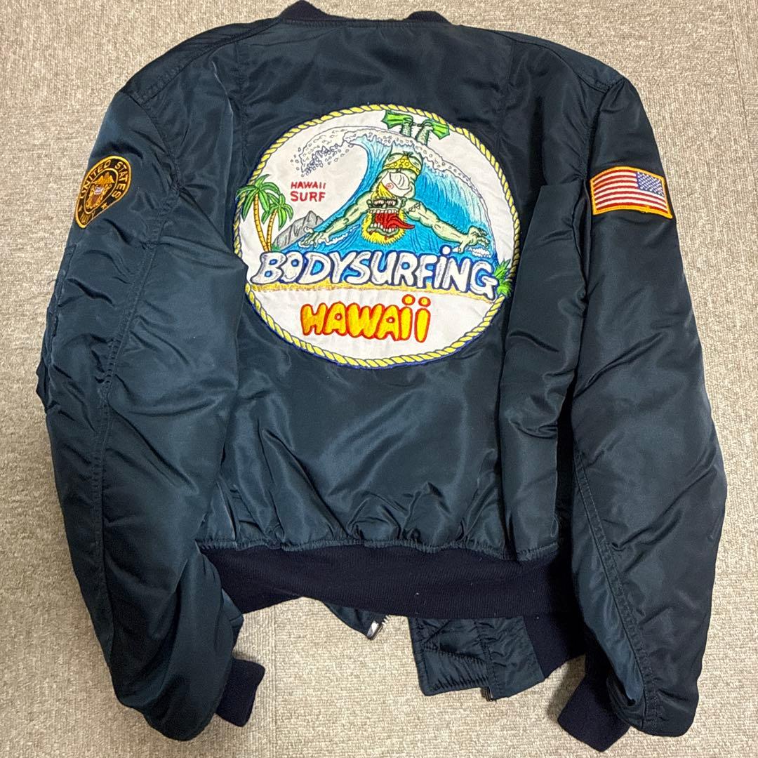 ALPHA 刺繍入りのMA1