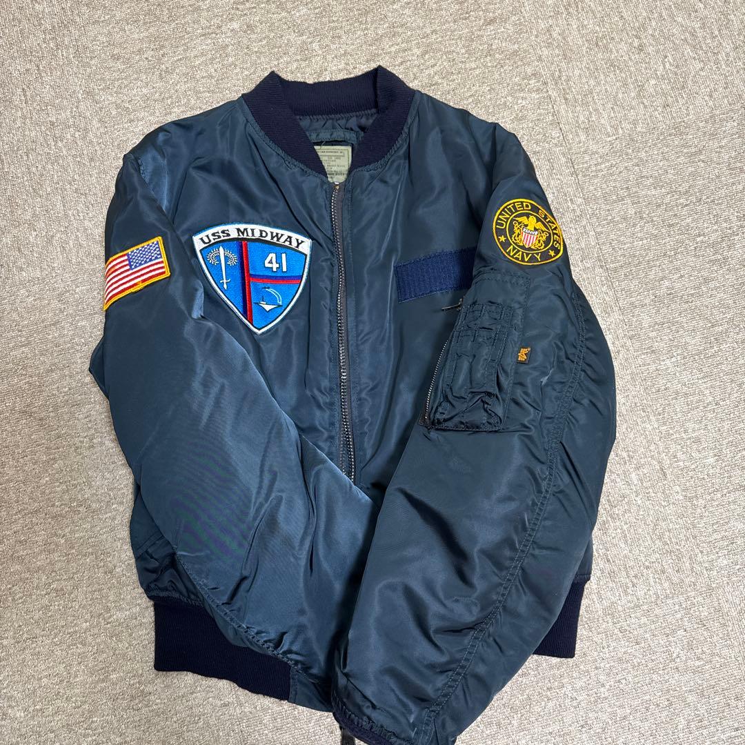 ALPHA 刺繍入りのMA1