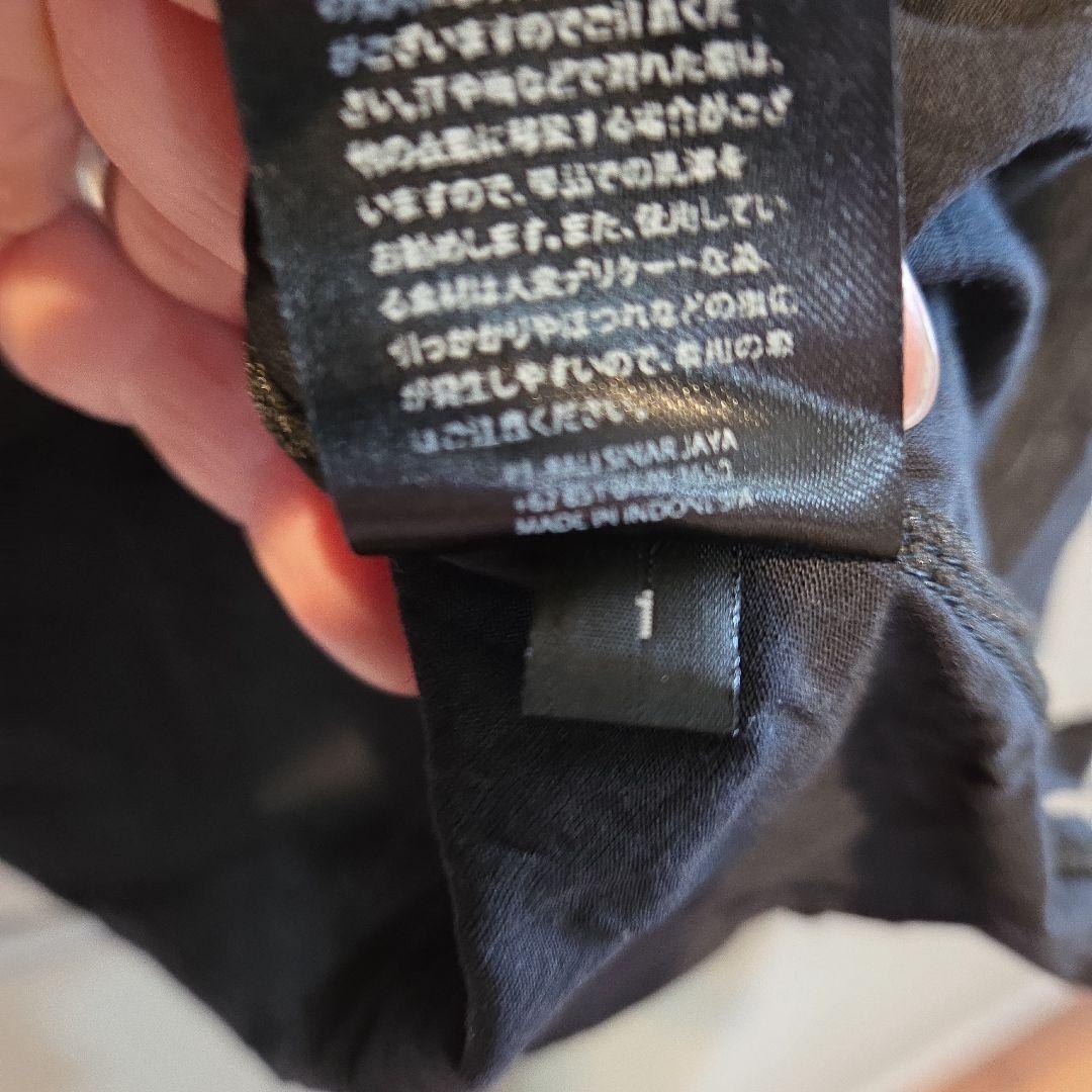 ケムリ スカルと花のグラフィックTシャツ