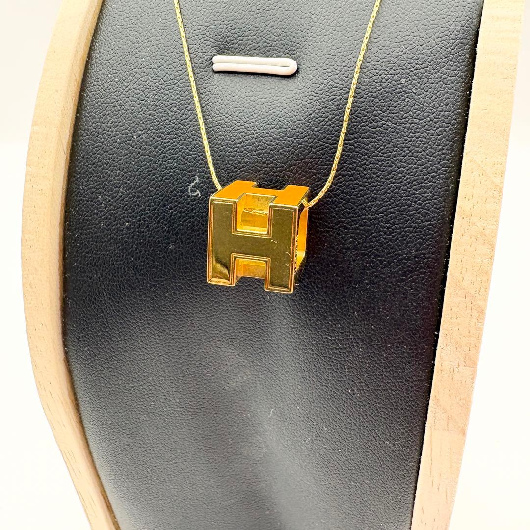 HERMES エルメス　H ロゴ　ペンダント ネックレス　オレンジ　ゴールド
