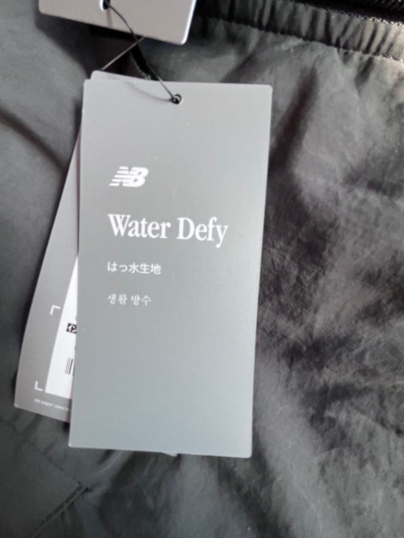 セール[ニューバランス] メンズ コーチパーカ Ｓ（162-170日本サイズM)