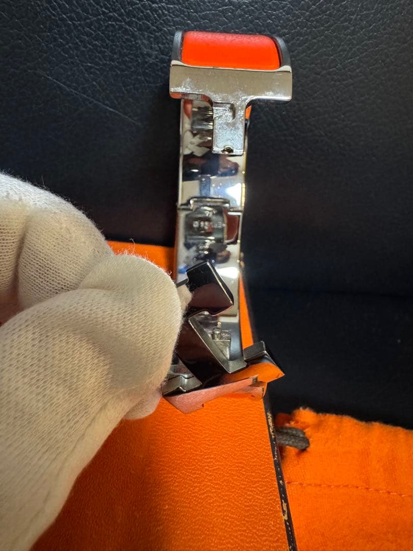 HERMÈS（エルメス）のオレンジバングル