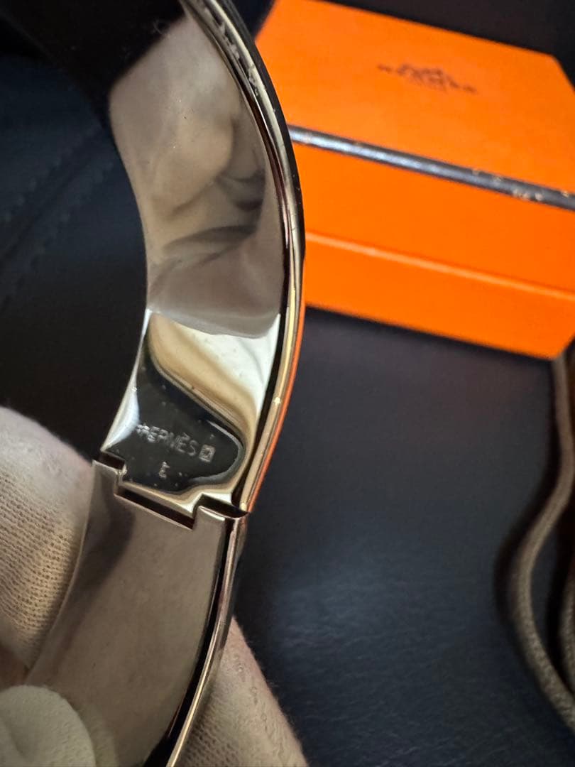 HERMÈS（エルメス）のオレンジバングル