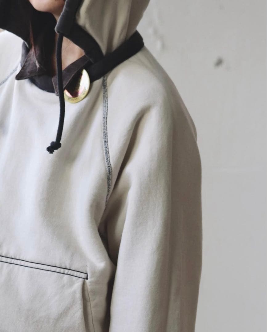 トップス FUMIKA_UCHIDA 2-TONE PULLOVER HOODIE