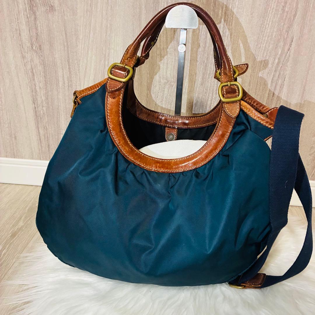 Felisi フェリージ　ショルダーバッグ　ナイロン　レザー　ハーフムーン