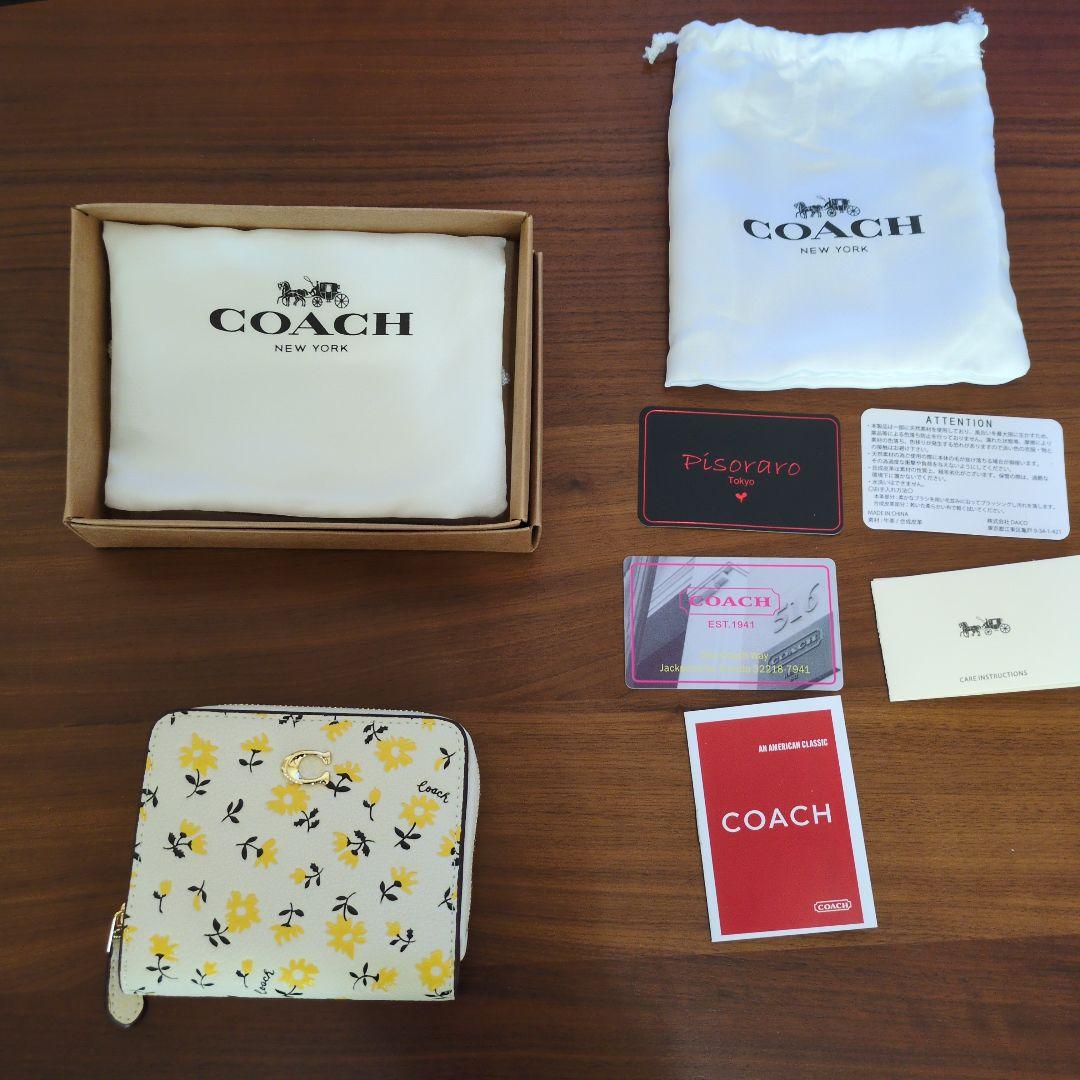 m*u様 COACH 花柄 二つ折り財布