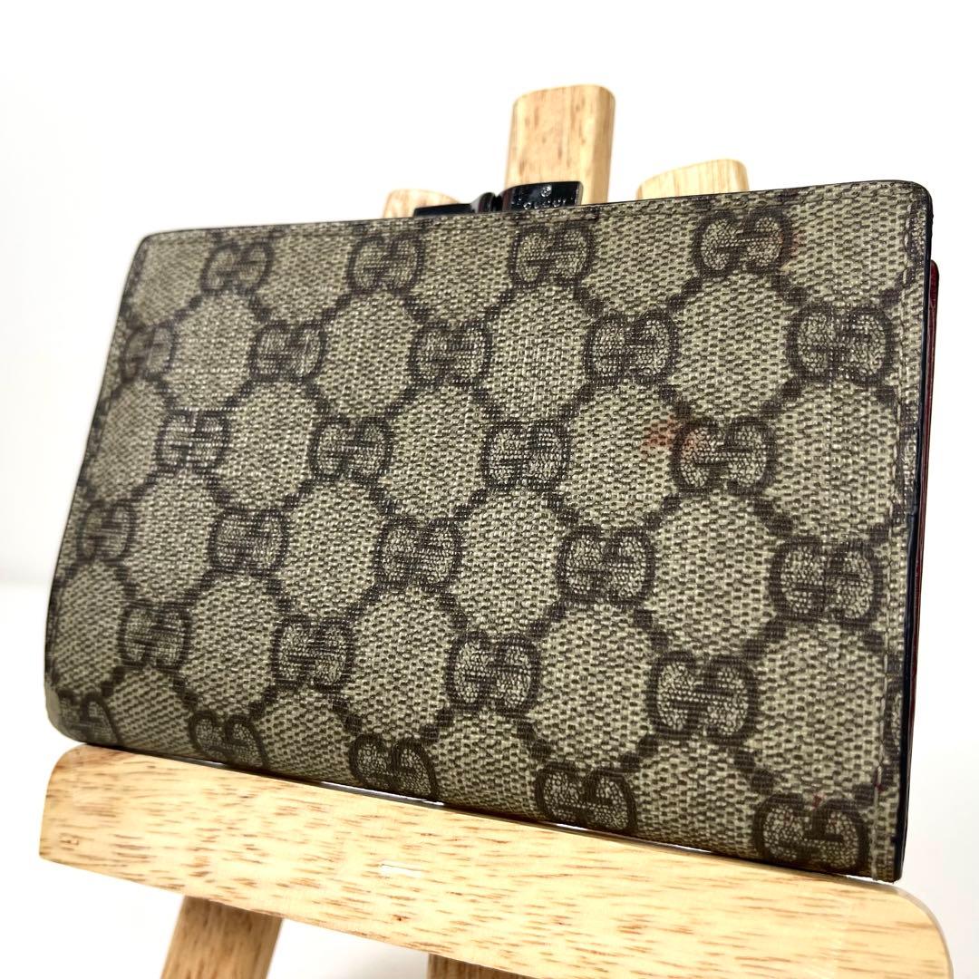 グッチ　折り財布　GGスプリーム　ロゴ総柄　がま口　ミディアム　PVC レザー