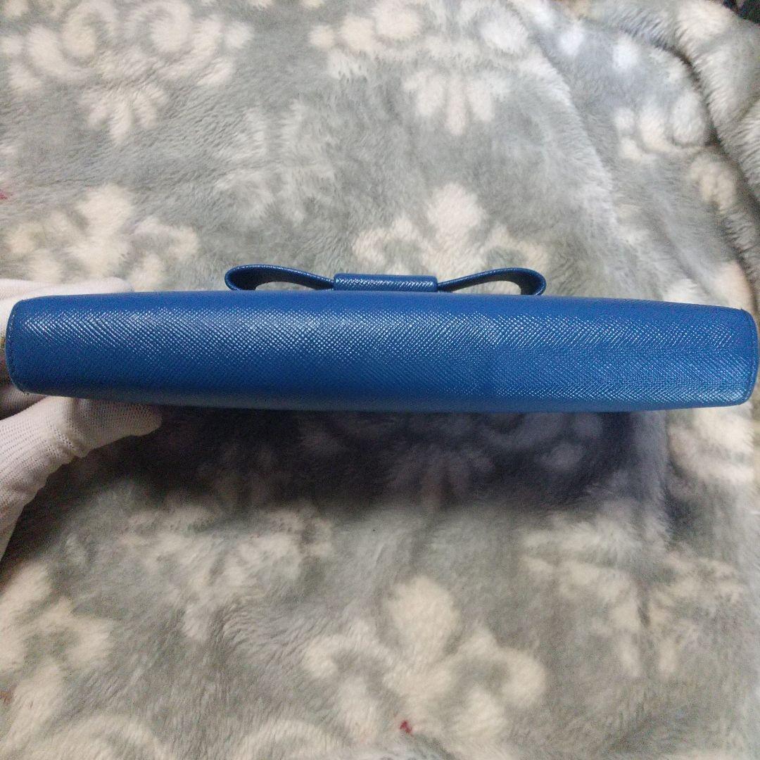 PRADAサフィアーノラウンドファスナー リボン付き長財布