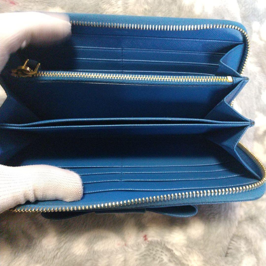 PRADAサフィアーノラウンドファスナー リボン付き長財布