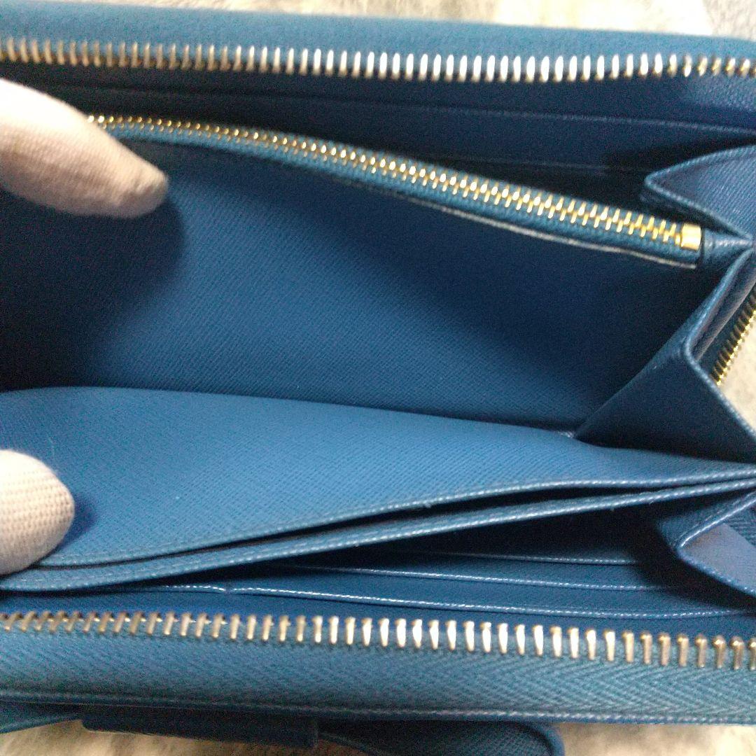 PRADAサフィアーノラウンドファスナー リボン付き長財布