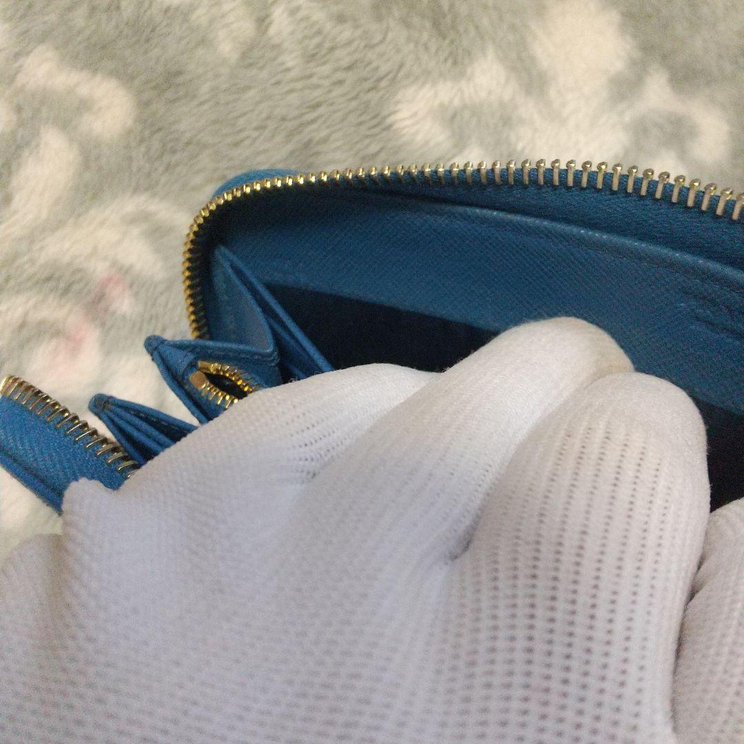 PRADAサフィアーノラウンドファスナー リボン付き長財布