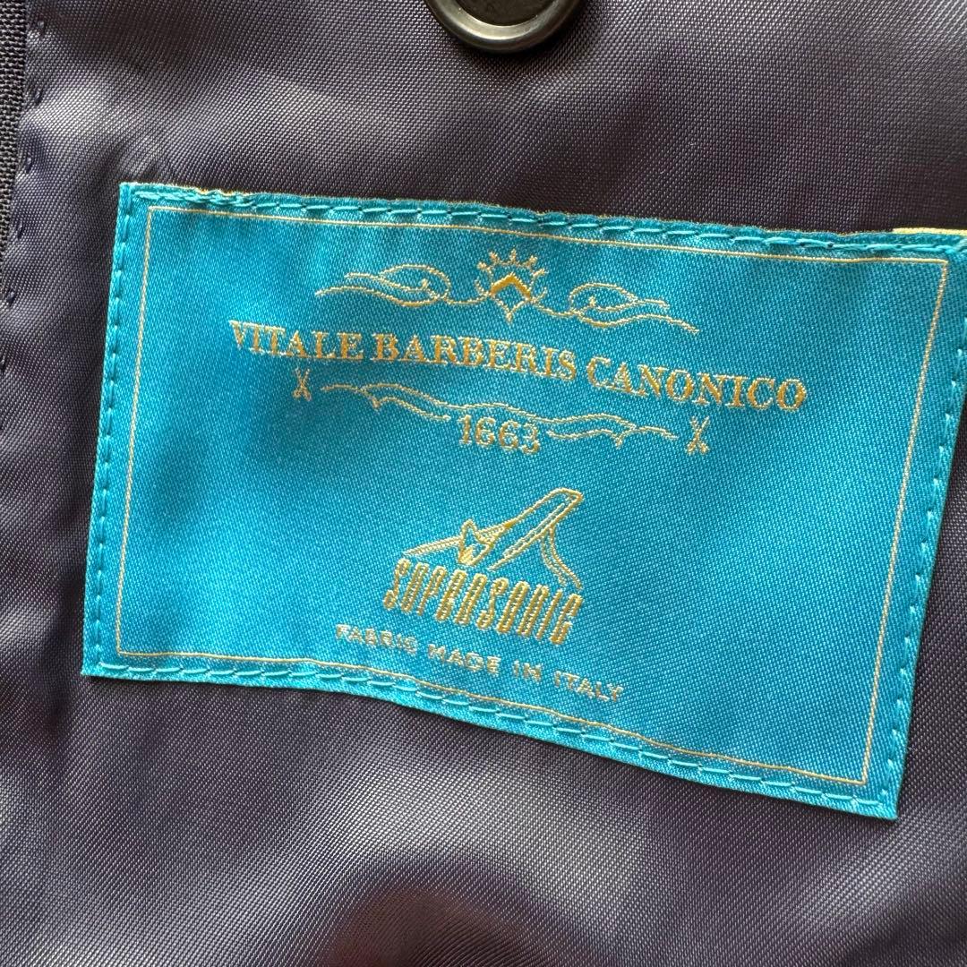 ユニバーサルランゲージ　カノニコ　スーツ　セットアップ　ネイビー　トラベル　L