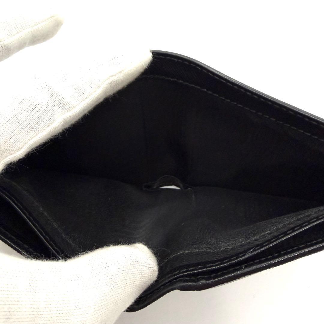 PRADA 二つ折り財布 ブラック　サフィアーノレザー　ロゴ入り　イタリア製