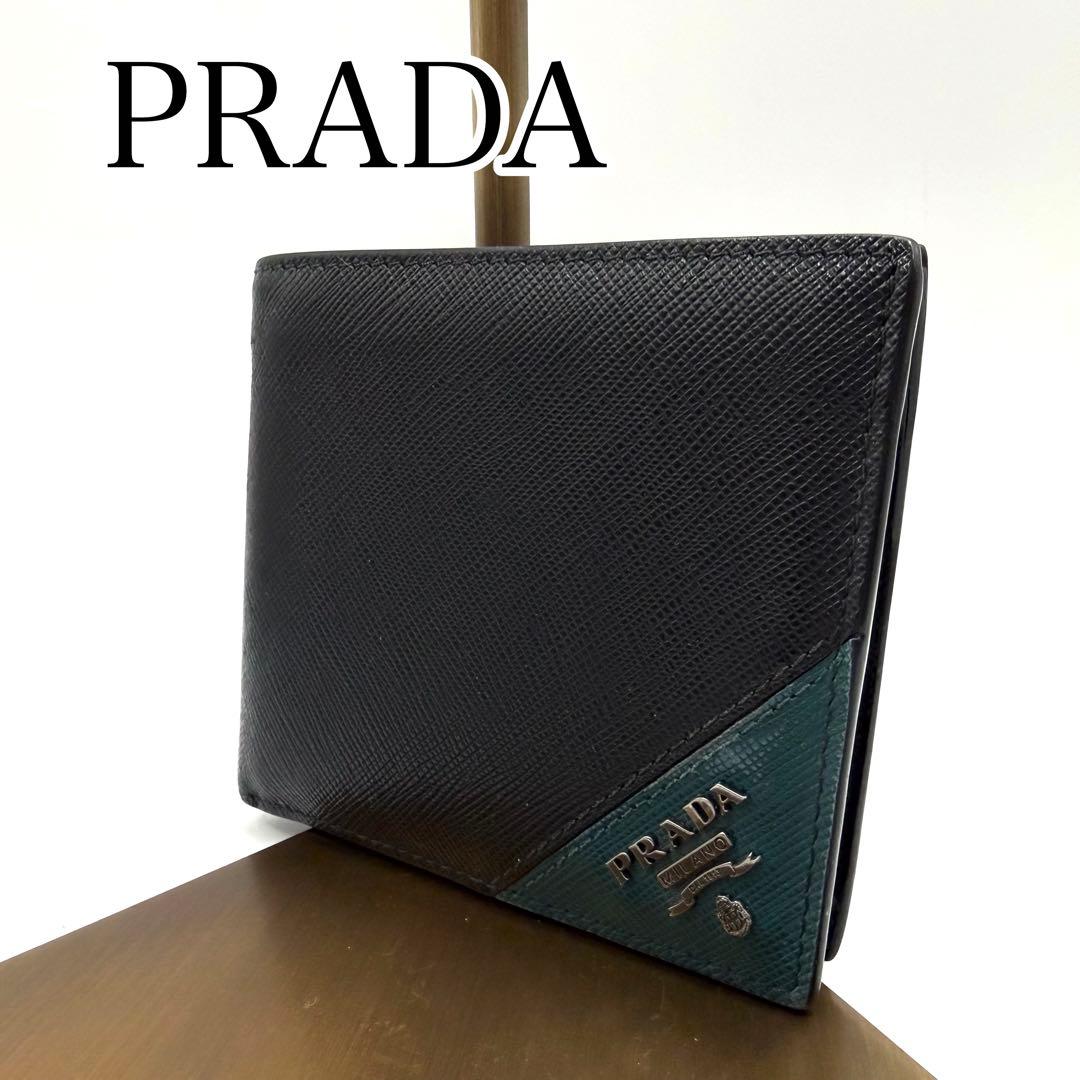 PRADA 二つ折り財布 ブラック　サフィアーノレザー　ロゴ入り　イタリア製