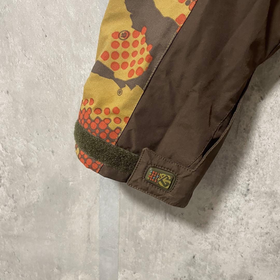 Burtonバートンスキーウェアスノーボードジャケットパーカー茶色ブラウンカモ柄